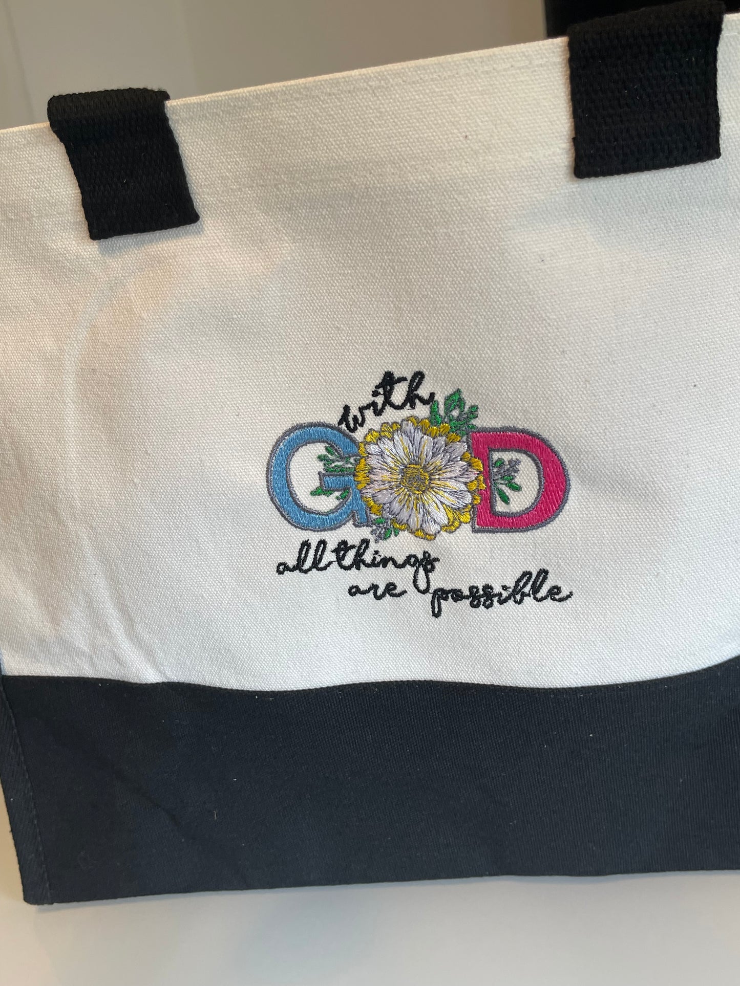 With God all things are possible, black and white embroidered canvas tote bag