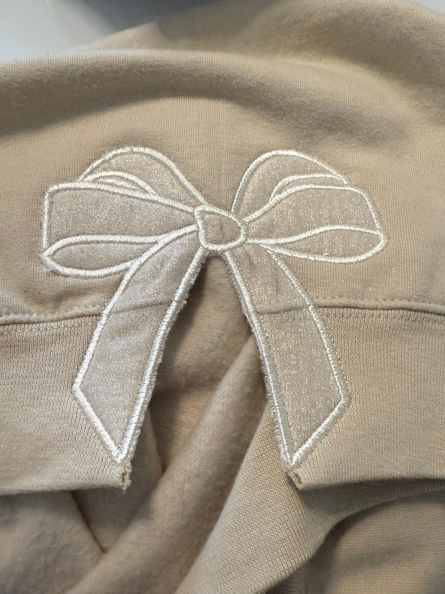 Long sleeve customized embroidered crewneck sweatshirt with monogram and bows on the sides